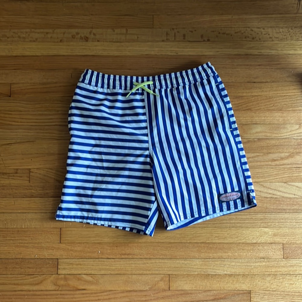 Blue and white striped men’s swim trunks